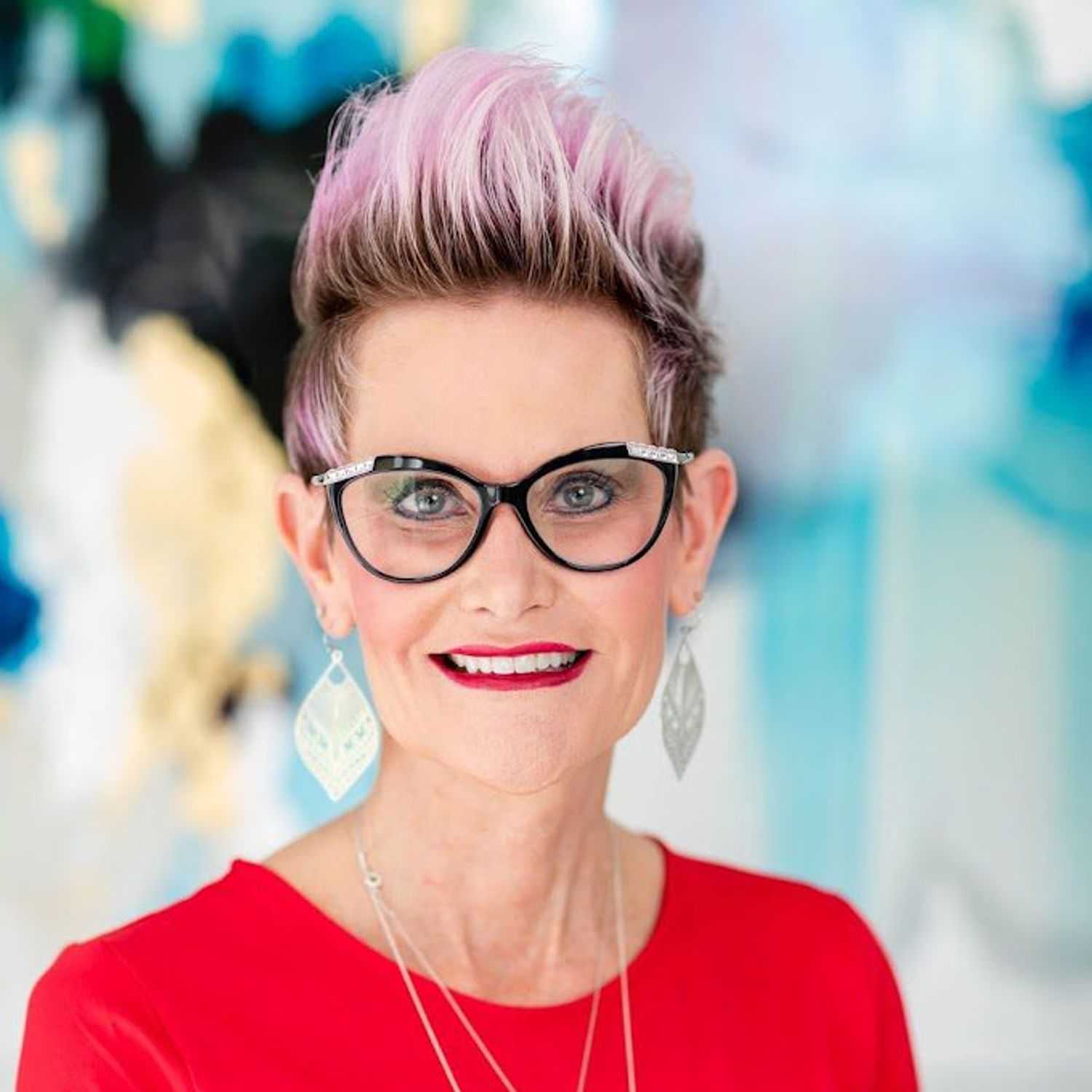 Portrait of Michelle Harazak, a professional stylist at Pura Vida Salon, showcasing their expertise and style.