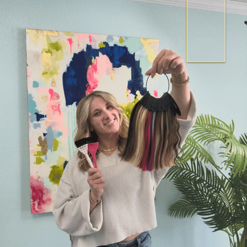 Portrait of Brooke, a professional stylist at Pura Vida Salon, showcasing their expertise and style.