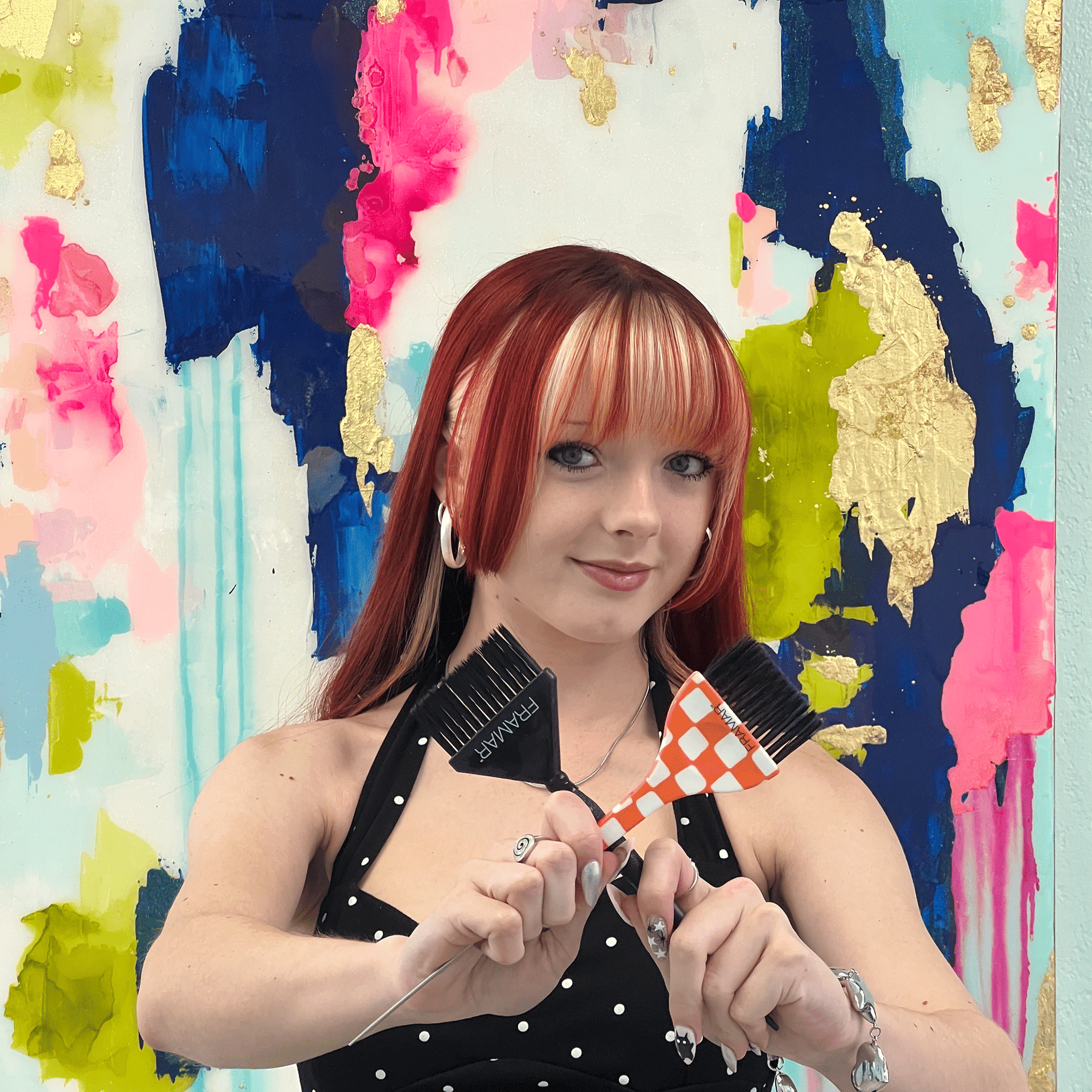 Portrait of Amanda, a professional stylist at Pura Vida Salon, showcasing their expertise and style.